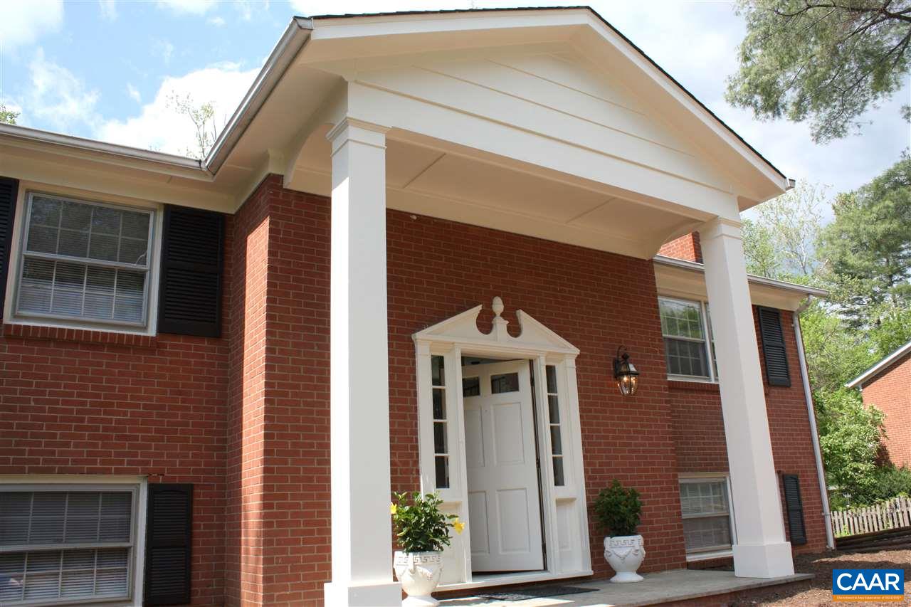 2405 Barracks Road Charlottesville, VA 22901 - Photo 1 of 48 a front view of a house with a yard