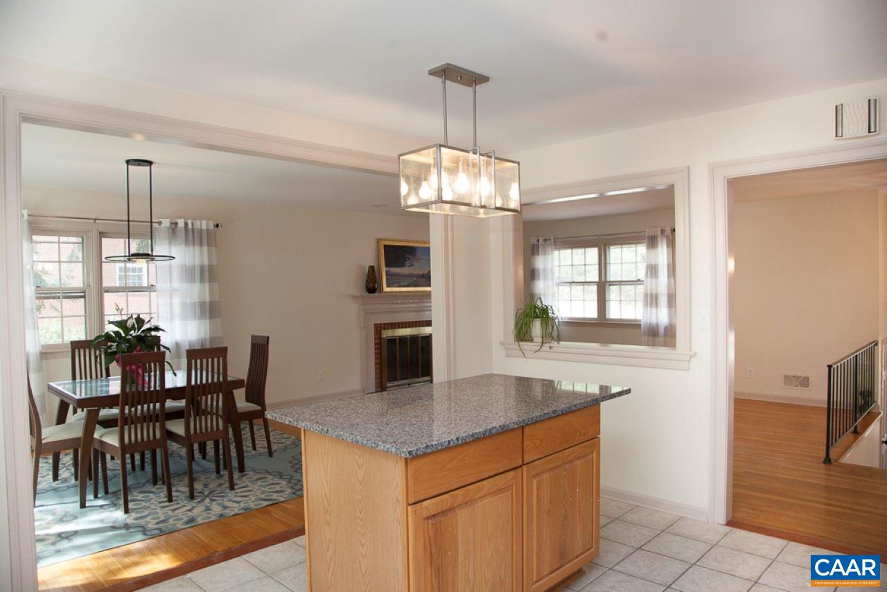 2405 Barracks Road Charlottesville, VA 22901 - Photo 23 of 48 a kitchen that has a table and chairs in it