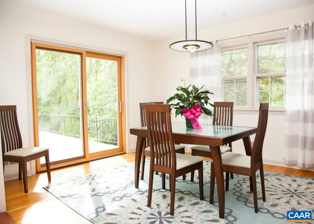 2405 Barracks Road Charlottesville, VA 22901 - Photo 25 of 48 a view of a dining room with furniture window and outside view