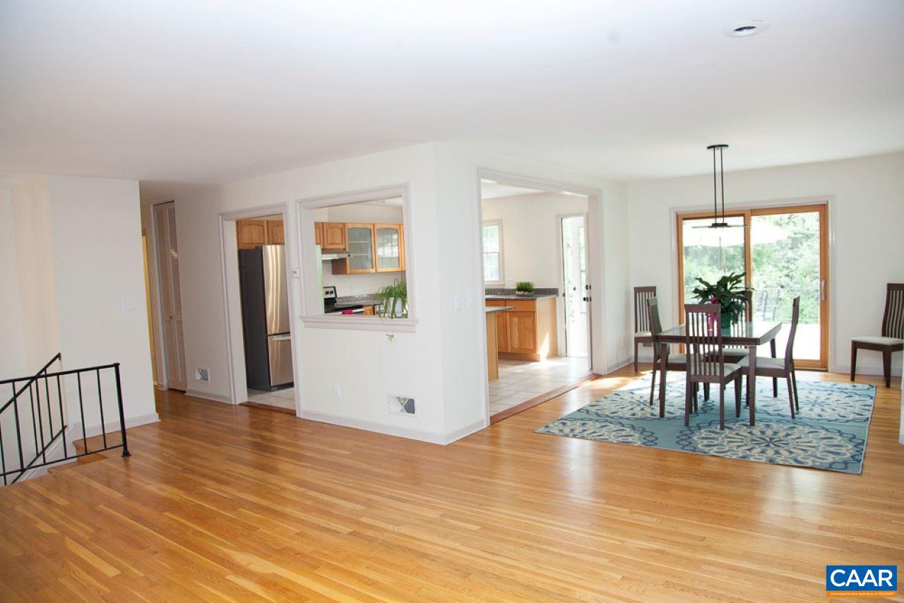 2405 Barracks Road Charlottesville, VA 22901 - Photo 27 of 48 a view of a dining room with furniture and wooden floor