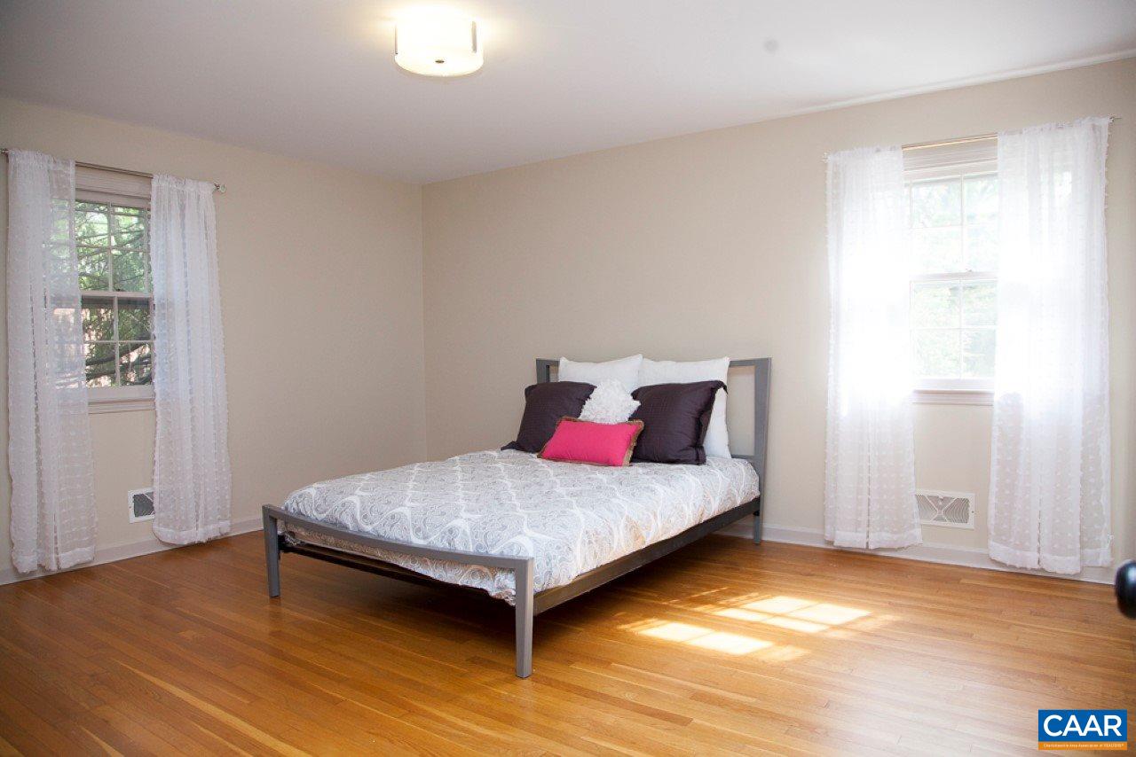 2405 Barracks Road Charlottesville, VA 22901 - Photo 29 of 48 a bedroom with a bed and window