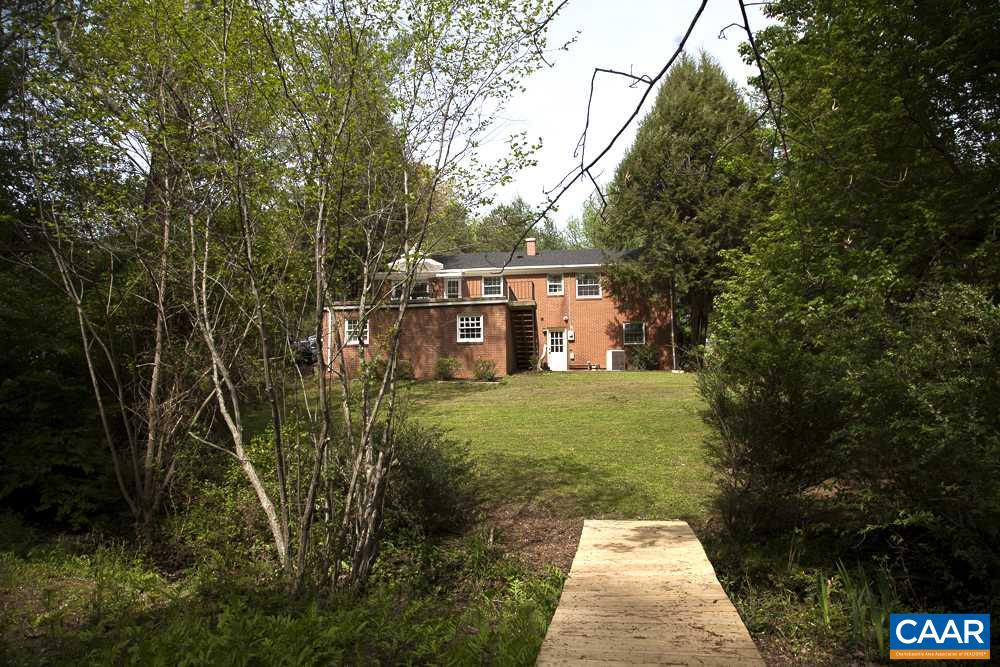 2405 Barracks Road Charlottesville, VA 22901 - Photo 3 of 48 a view of a house with a yard