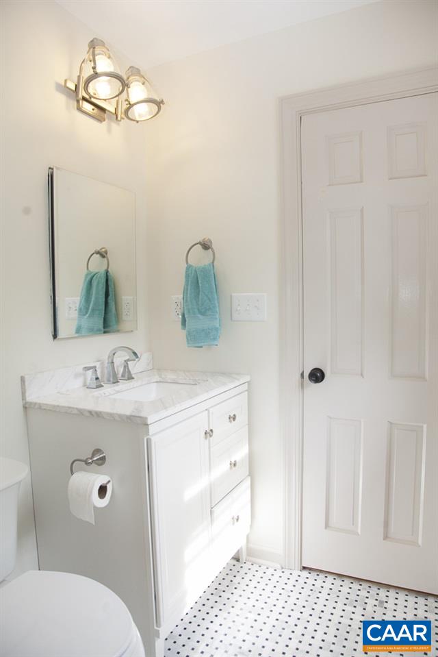 2405 Barracks Road Charlottesville, VA 22901 - Photo 31 of 48 a bathroom with a sink a toilet and shower