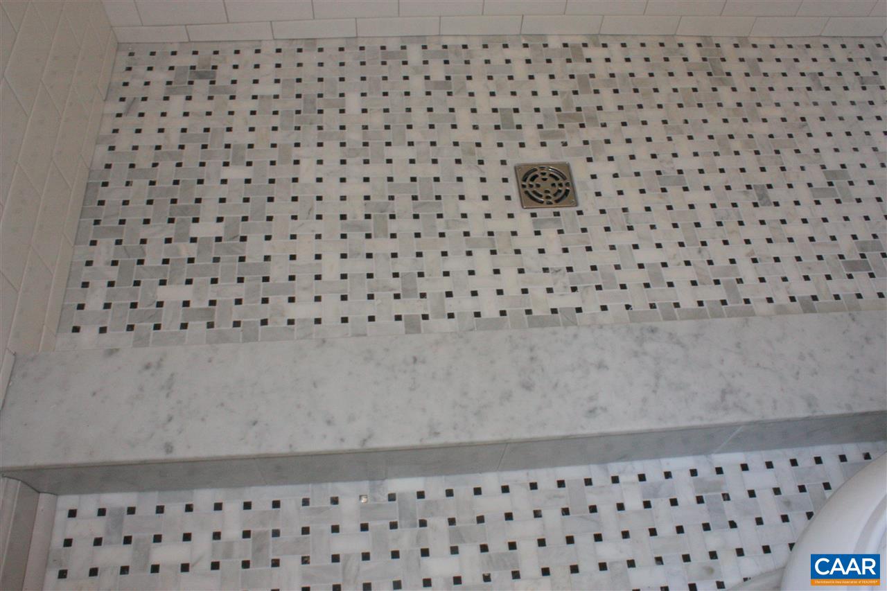 2405 Barracks Road Charlottesville, VA 22901 - Photo 35 of 48 a bathroom with a black white checkered floor