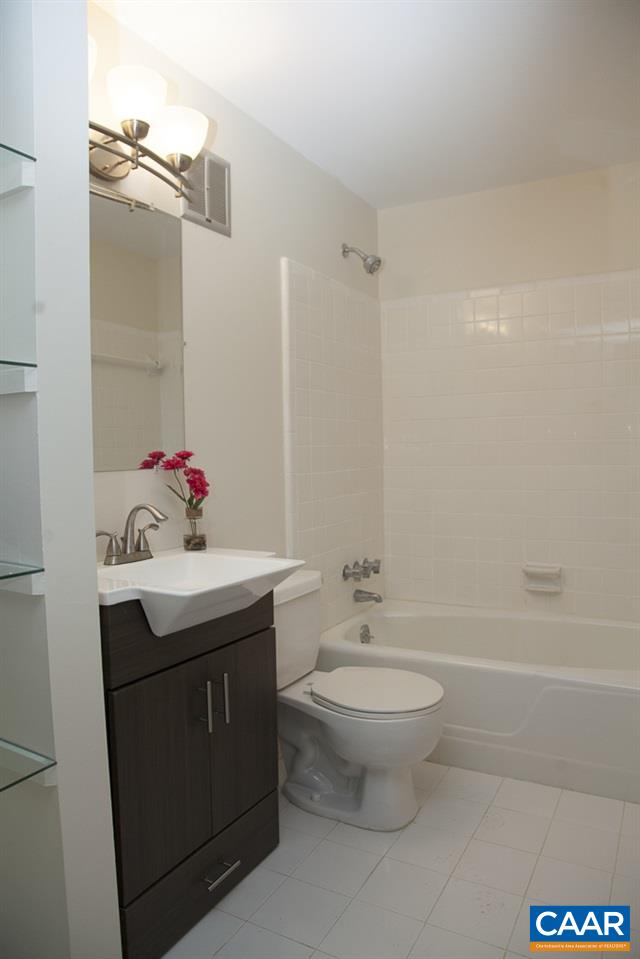 2405 Barracks Road Charlottesville, VA 22901 - Photo 44 of 48 a bathroom with a sink toilet and shower