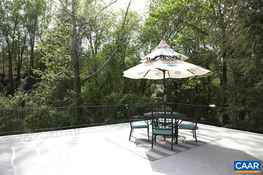 2405 Barracks Road Charlottesville, VA 22901 - Photo 6 of 48 a patio with table and chairs