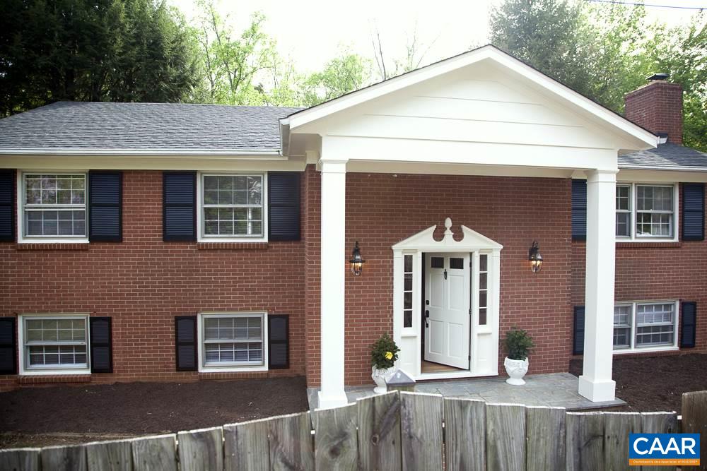 2405 Barracks Road Charlottesville, VA 22901 - Photo 9 of 48 a front view of a house with glass windows