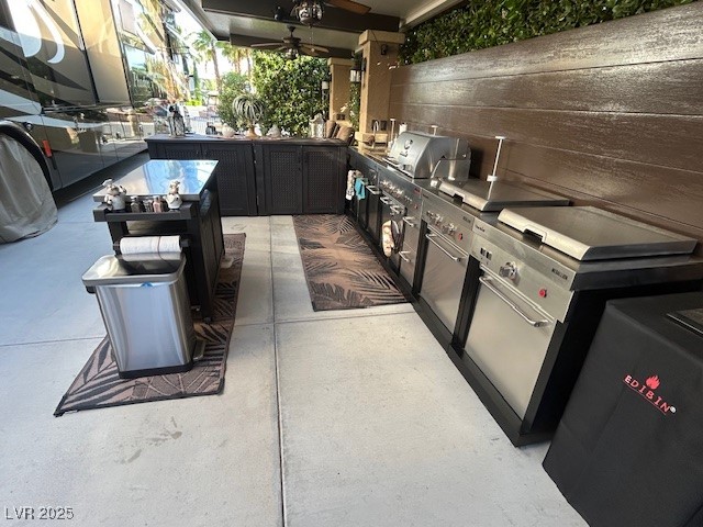8175 Arville Street, Unit 210 Las Vegas, NV 89139 - Photo 13 of 36 View of patio featuring an outdoor kitchen and ceiling fan