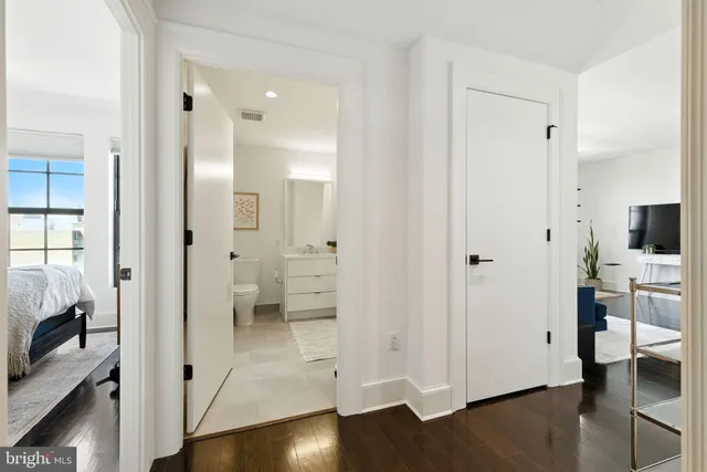 a view of a bathroom with a shower and a sink
