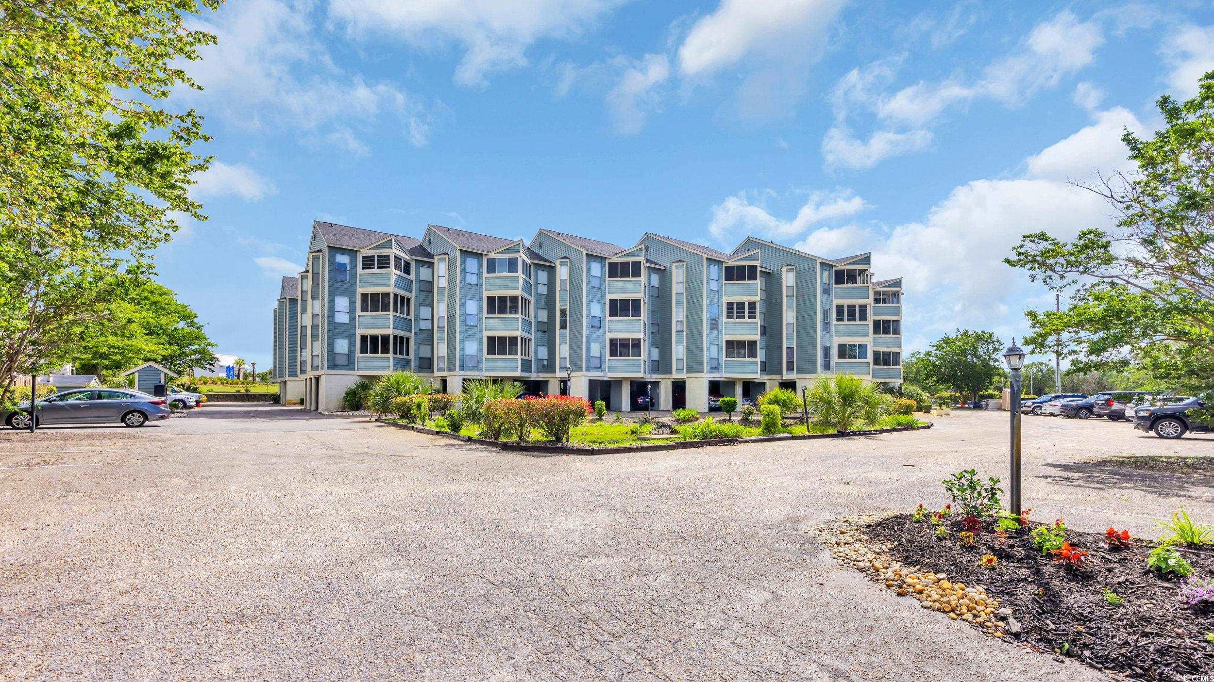 1101 Possum Trot Road, Unit C203 North Myrtle Beach, SC 29582 - Photo 1 of 29 View of apartment building / complex