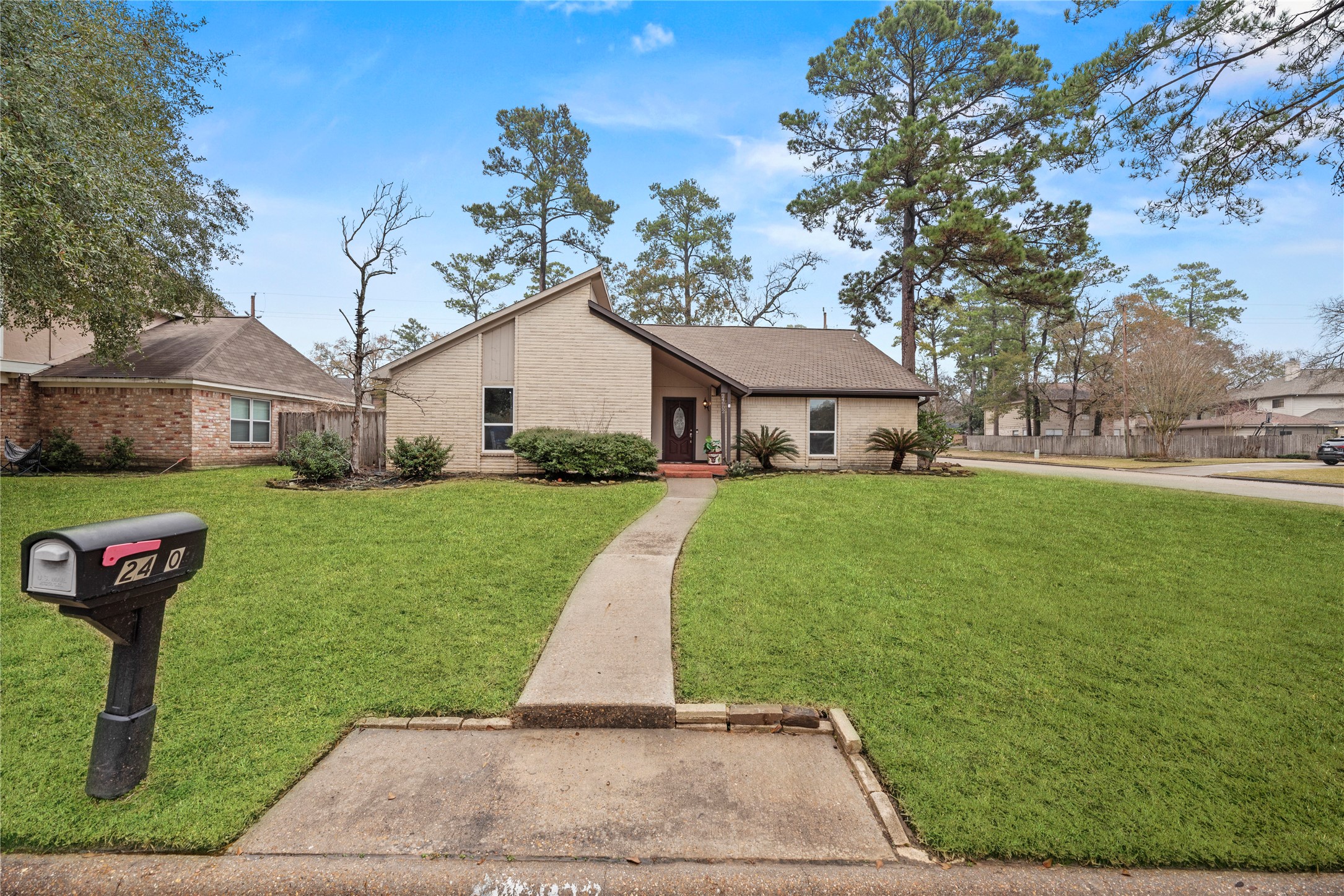 24902 Butterwick Drive Spring, TX 77389 - Photo 1 of 24 a front view of a house with garden