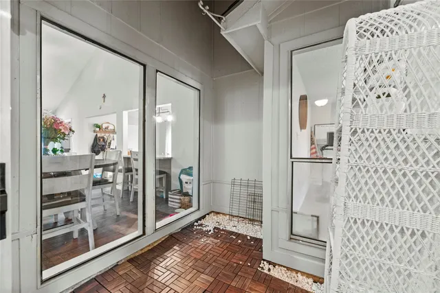a bathroom with a glass shower door