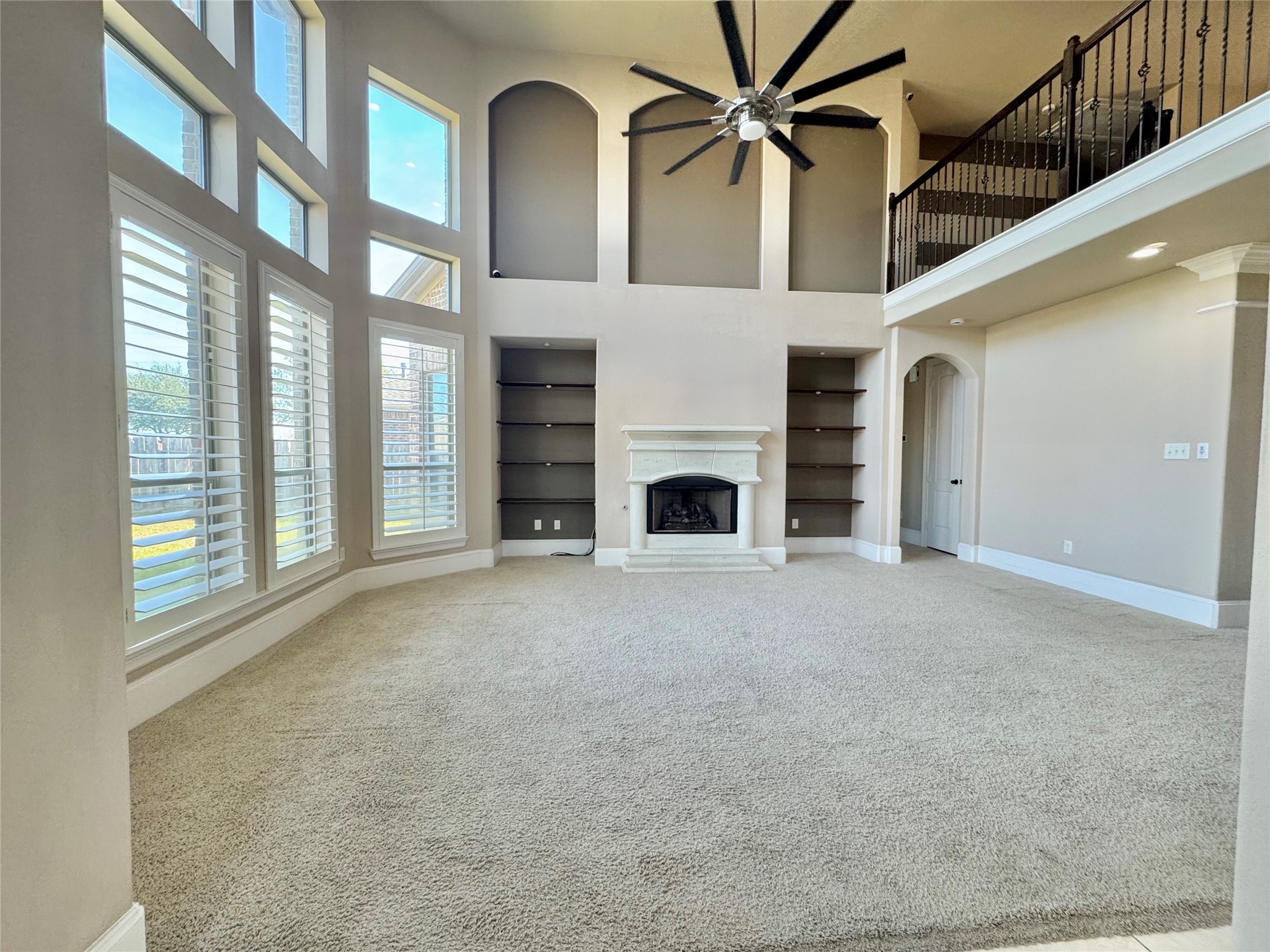 8447 Roland Canyon Drive Cypress, TX 77433 - Photo 15 of 48 a view of a livingroom with a fireplace and cabinet