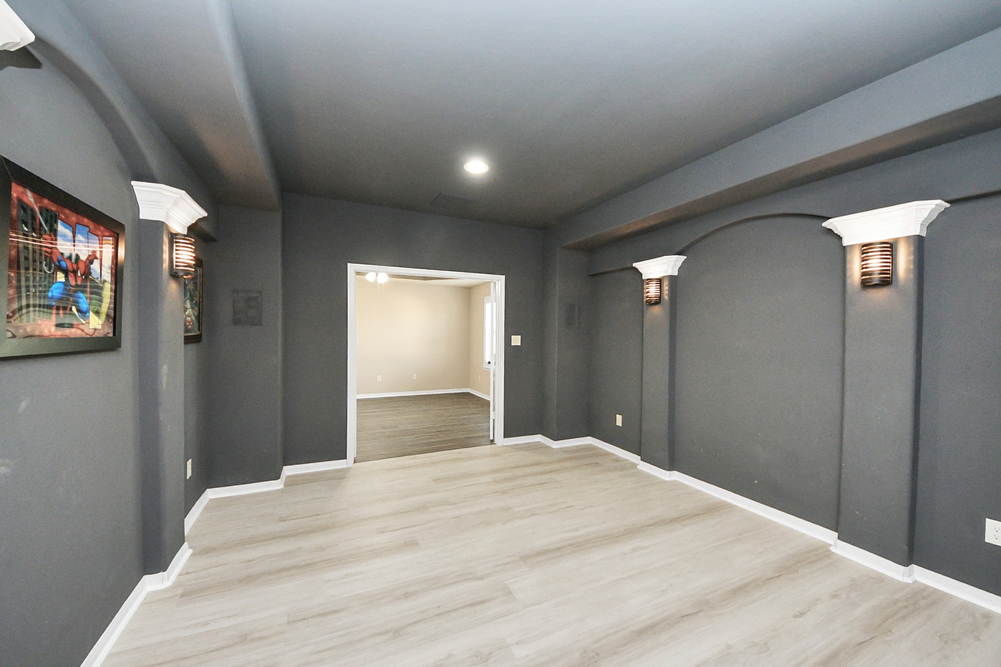 8447 Roland Canyon Drive Cypress, TX 77433 - Photo 30 of 48 a bedroom with a bed and a flat screen tv