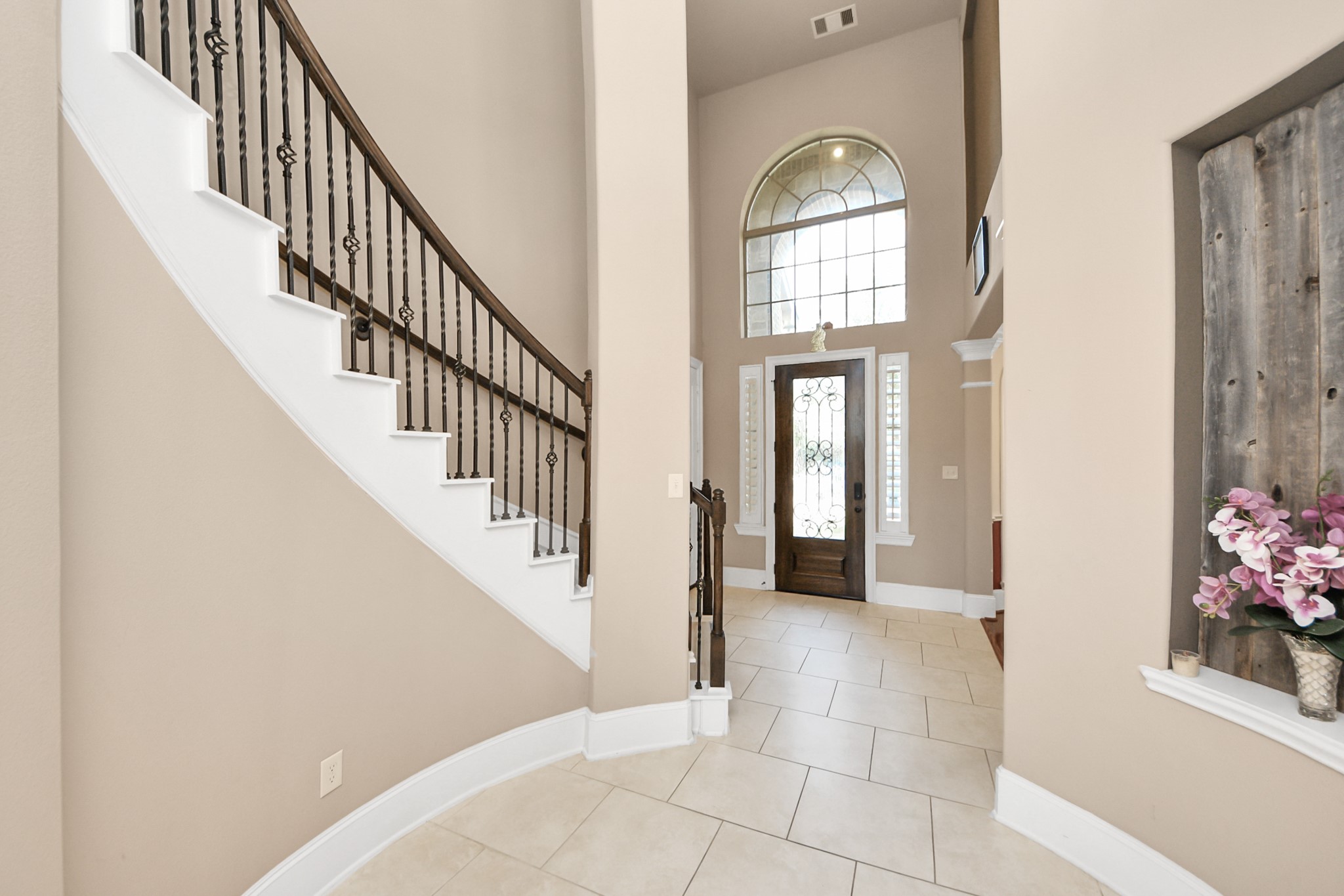 8447 Roland Canyon Drive Cypress, TX 77433 - Photo 3 of 48 a view of entryway and hall with a window