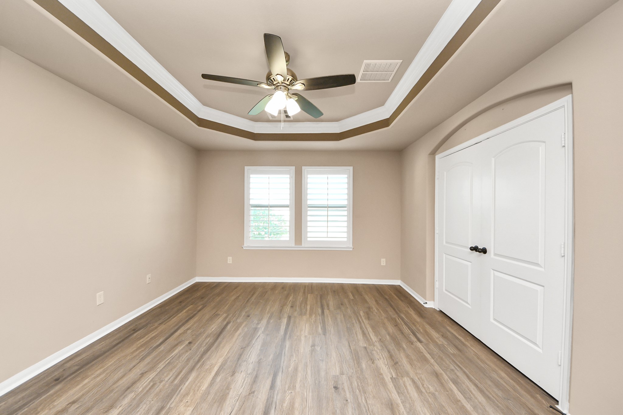 8447 Roland Canyon Drive Cypress, TX 77433 - Photo 37 of 48 wooden floor in an empty room with a window