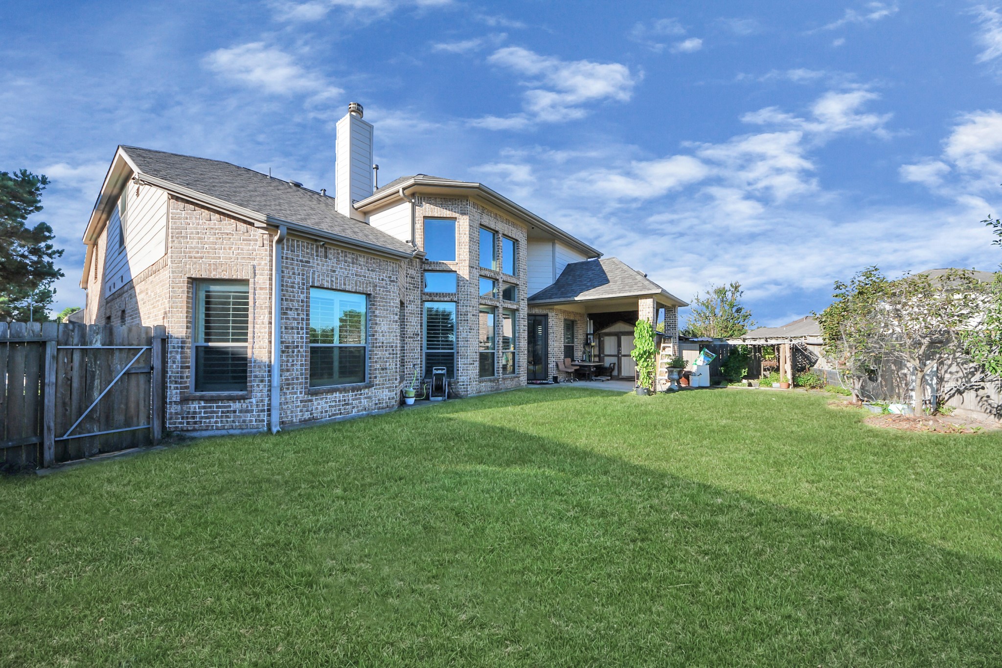 8447 Roland Canyon Drive Cypress, TX 77433 - Photo 42 of 48 a front view of house with yard and green space
