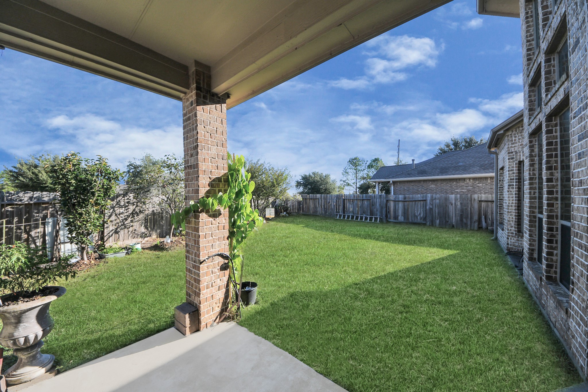 8447 Roland Canyon Drive Cypress, TX 77433 - Photo 44 of 48 a view of a house with a backyard