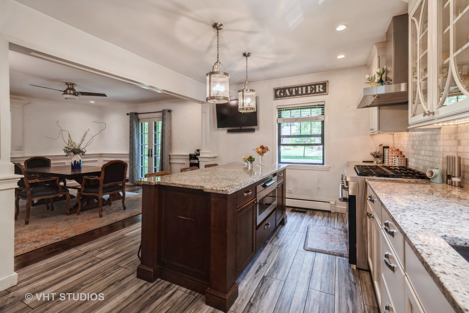 723 Gardner Road Flossmoor, IL 60422 - Photo 13 of 48 a kitchen with a stove and a wooden floor