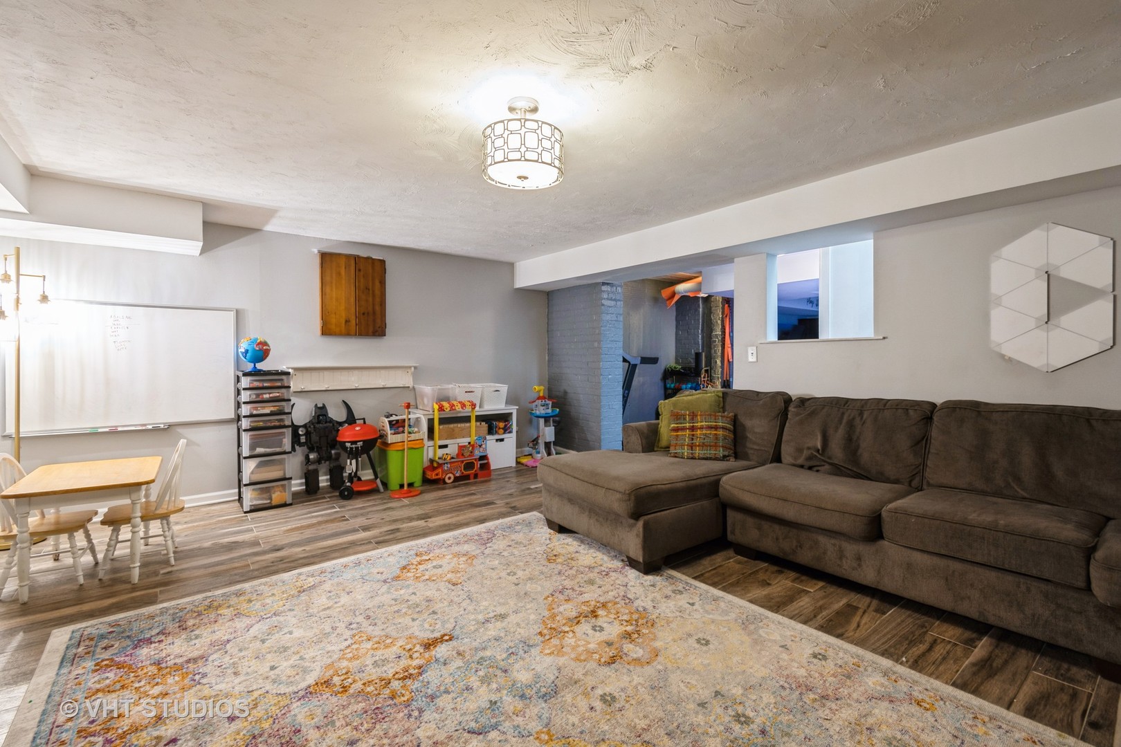 723 Gardner Road Flossmoor, IL 60422 - Photo 28 of 48 a living room with furniture and a flat screen tv