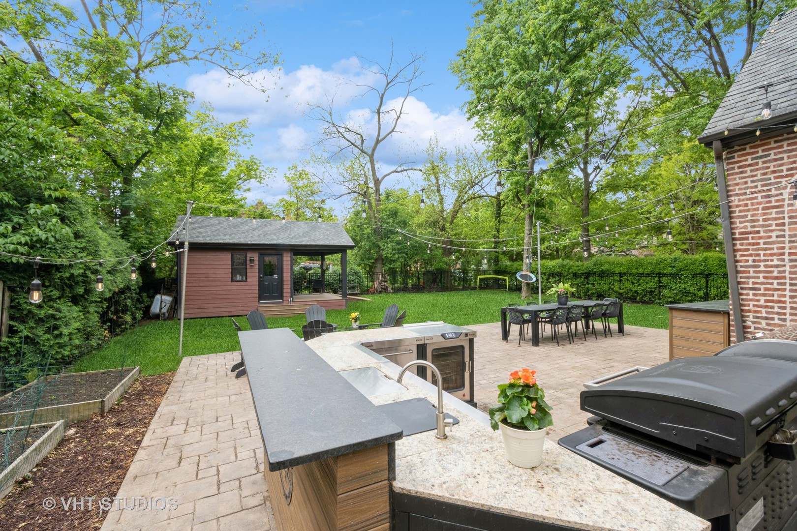 723 Gardner Road Flossmoor, IL 60422 - Photo 35 of 48 a view of a patio with couches table and chairs with plants and trees