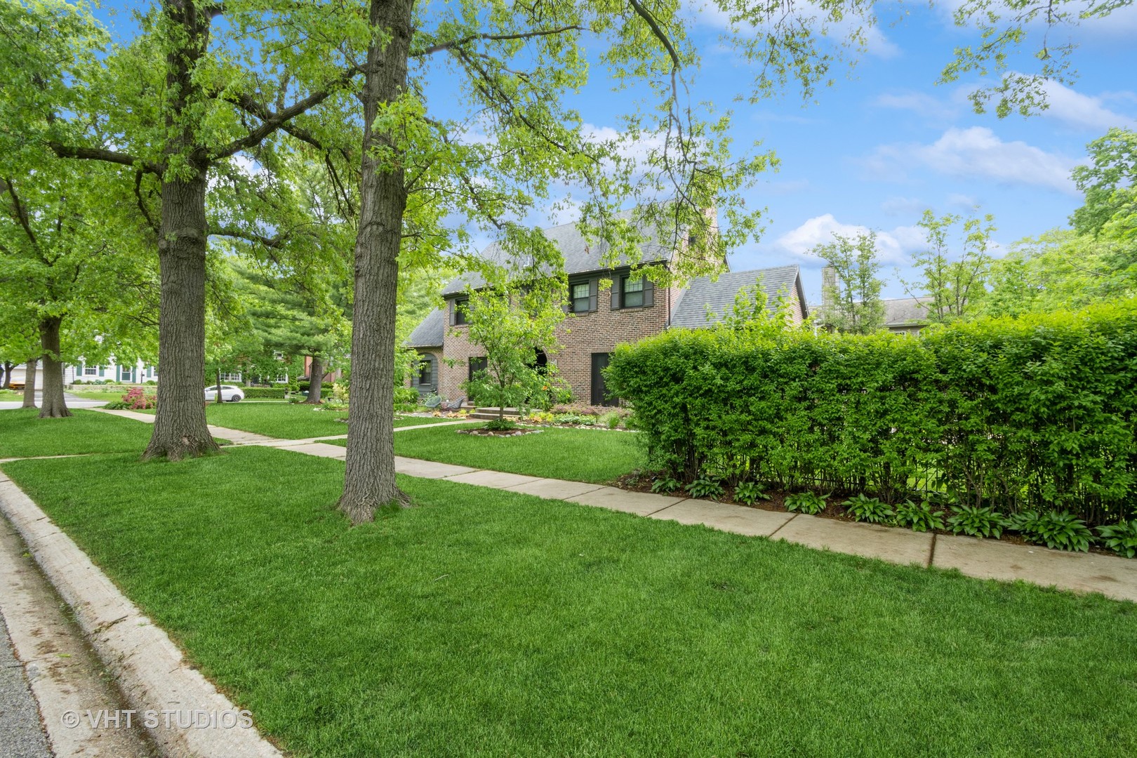 723 Gardner Road Flossmoor, IL 60422 - Photo 4 of 48 a view of a garden with a building in the background