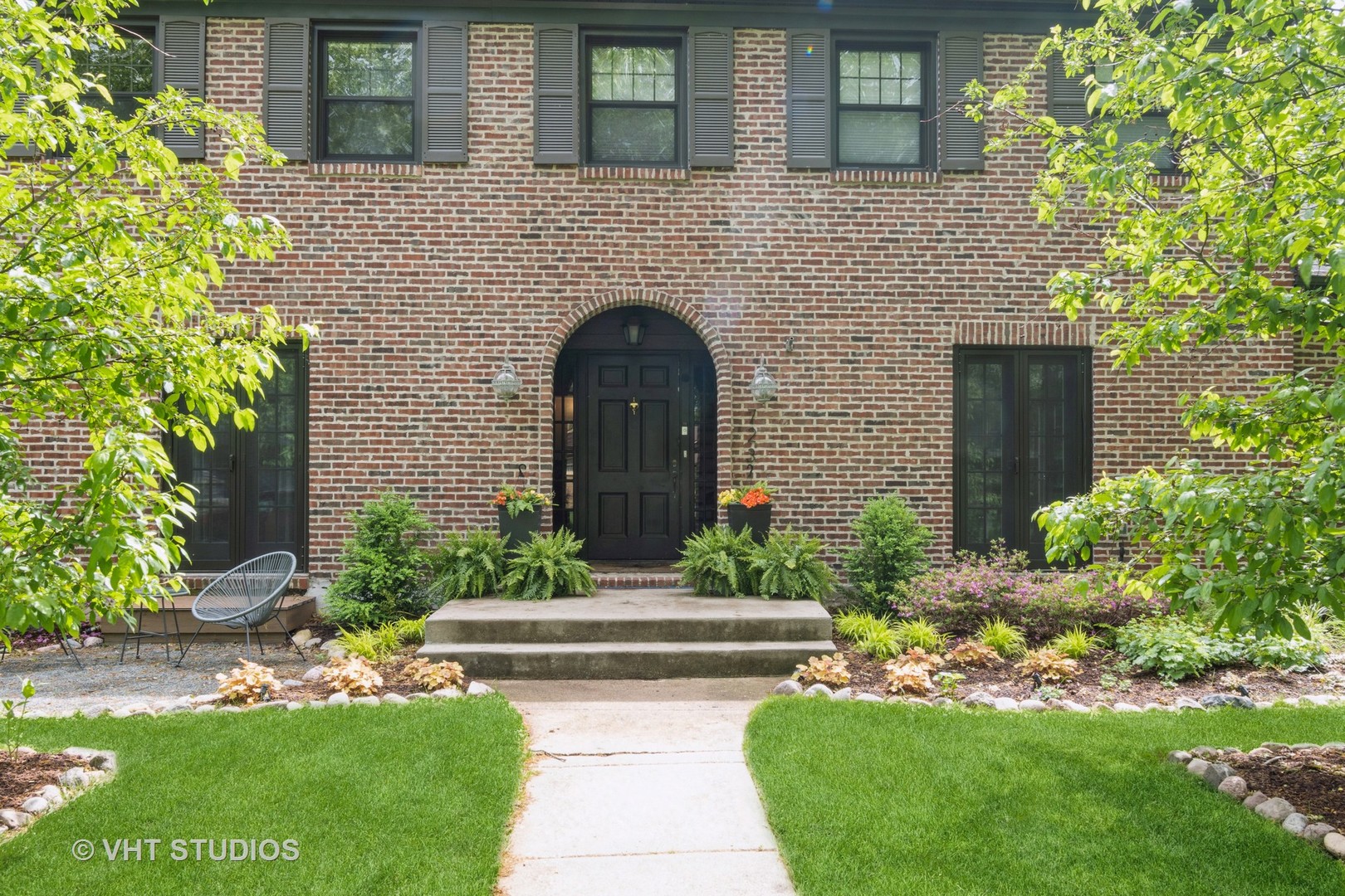 723 Gardner Road Flossmoor, IL 60422 - Photo 6 of 48 a front view of a house with a garden
