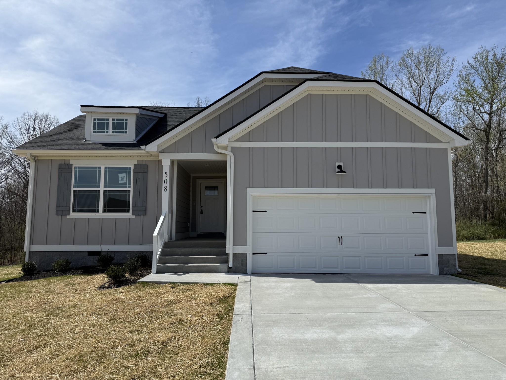 508 Mandalorian Way Dickson, TN 37055 - Photo 1 of 8 a front view of a house with a garage