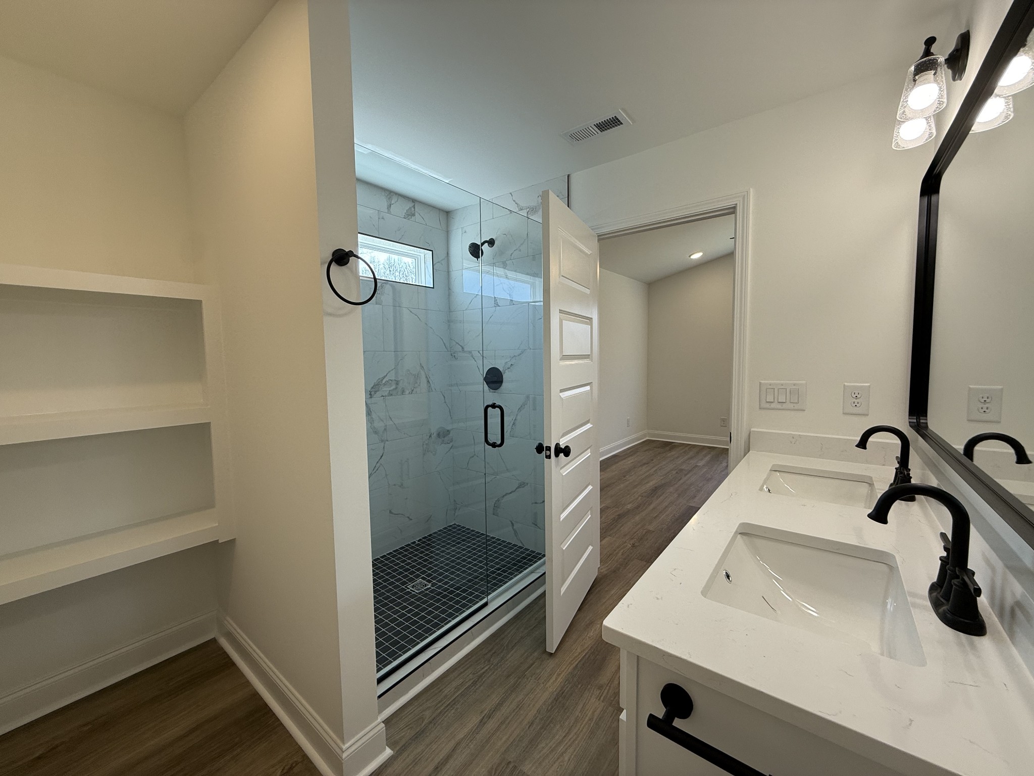 508 Mandalorian Way Dickson, TN 37055 - Photo 4 of 8 a bathroom with a sink a toilet and shower