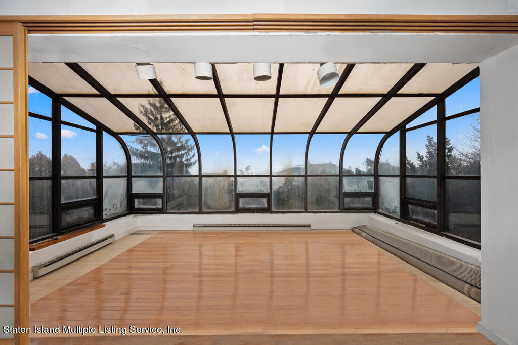 221 Benedict Road Staten Island, NY 10304 - Photo 9 of 42 Sunroom 1