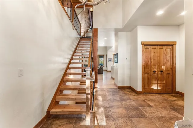 a view of entryway with wooden floor