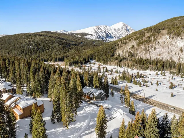 a view of a street with a building in the background