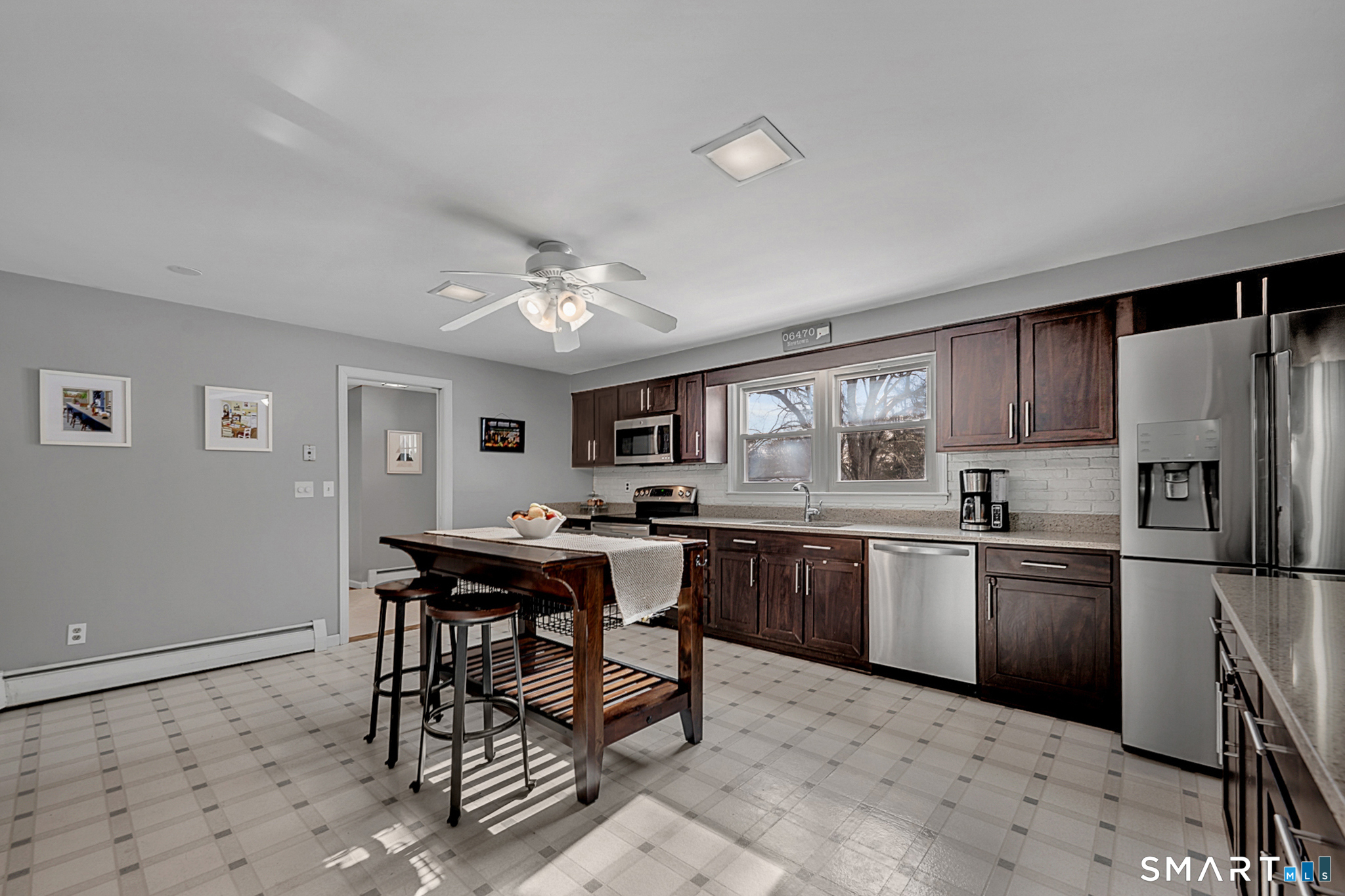 3 Grand Place Newtown, CT 06470 - Photo 11 of 40 This space features granite countertops and stainless steel appliances.