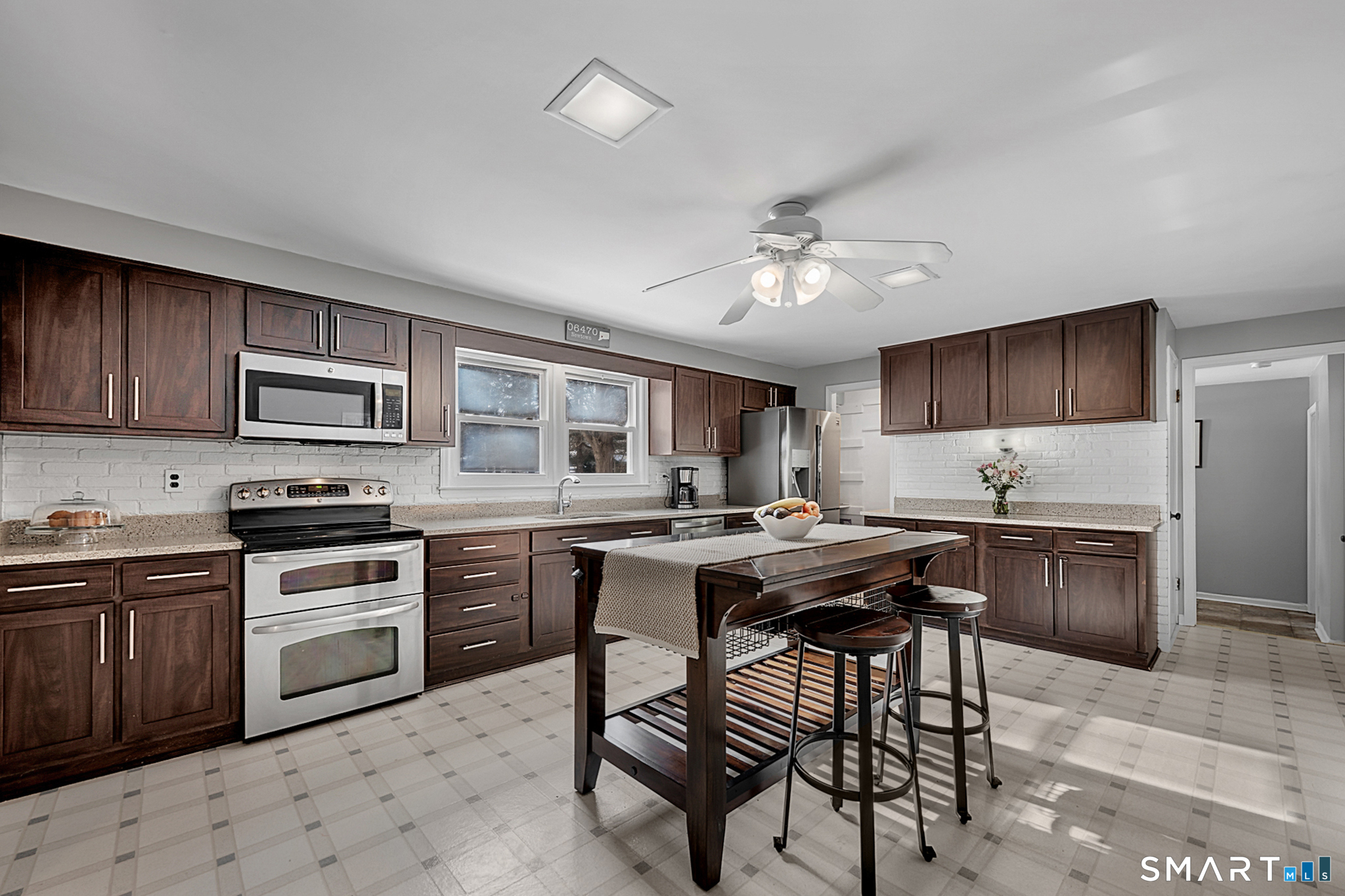 3 Grand Place Newtown, CT 06470 - Photo 12 of 40 The kitchen is also equipped with a large pantry for all your storage needs.