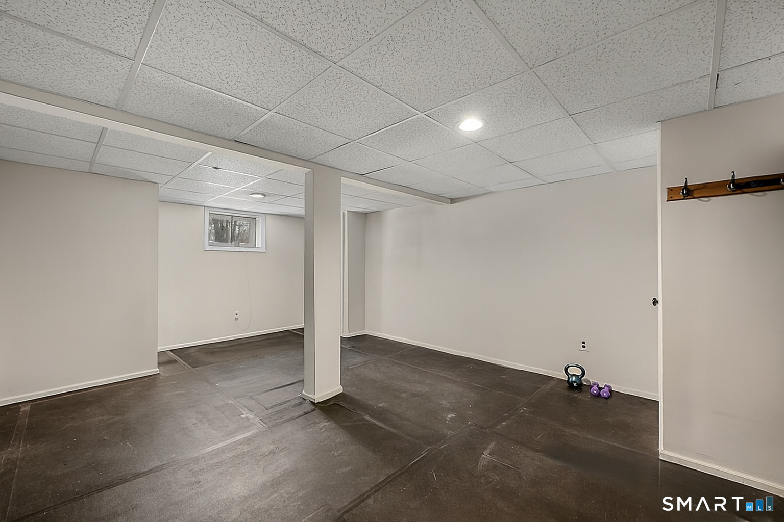 3 Grand Place Newtown, CT 06470 - Photo 23 of 40 There is a separate room for a personalized gym. Ample space allows for versatile workout routines and equipment.