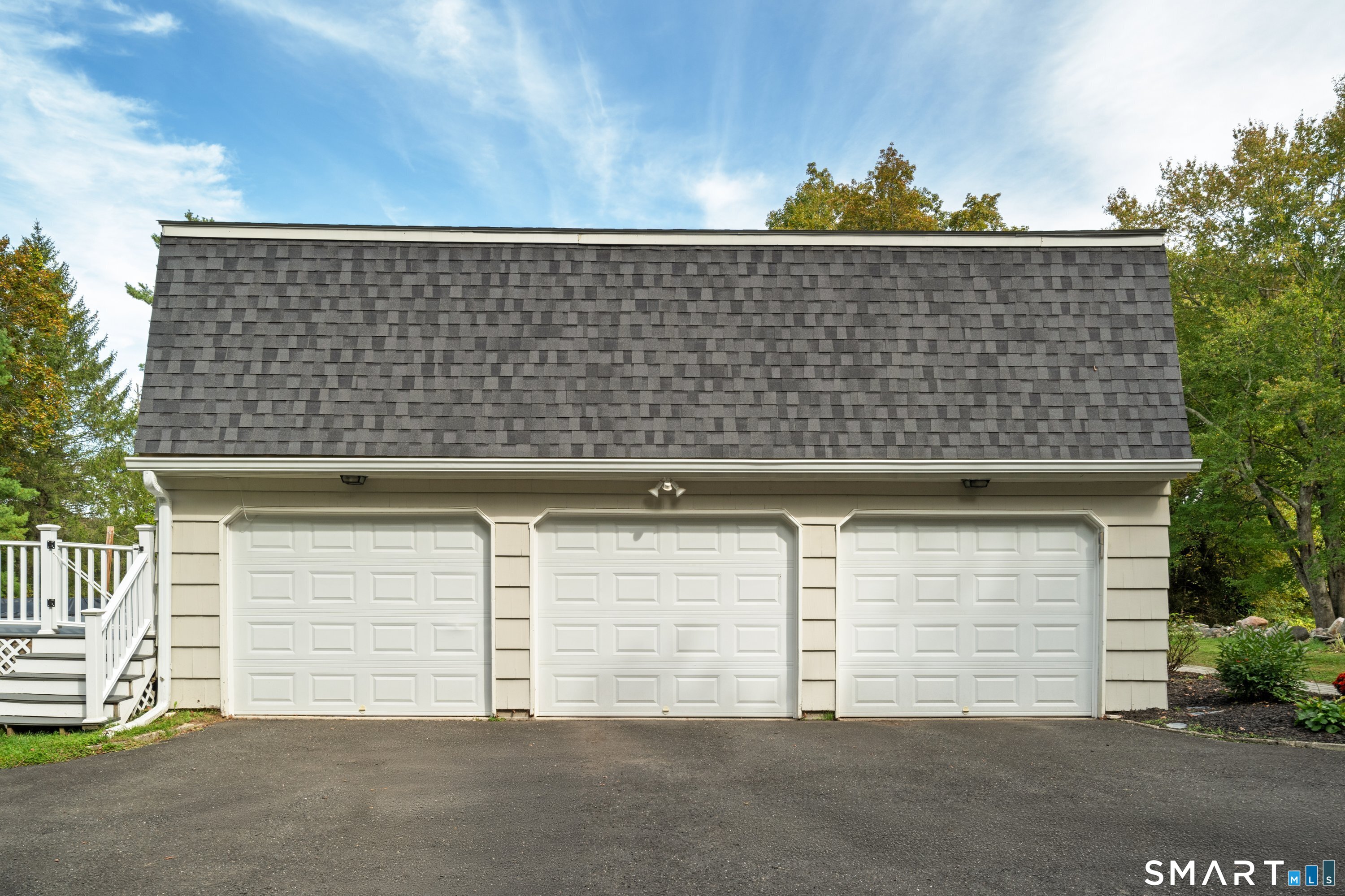 3 Grand Place Newtown, CT 06470 - Photo 31 of 40 The home boasts a three car garage providing ample space for vehicles and storage.