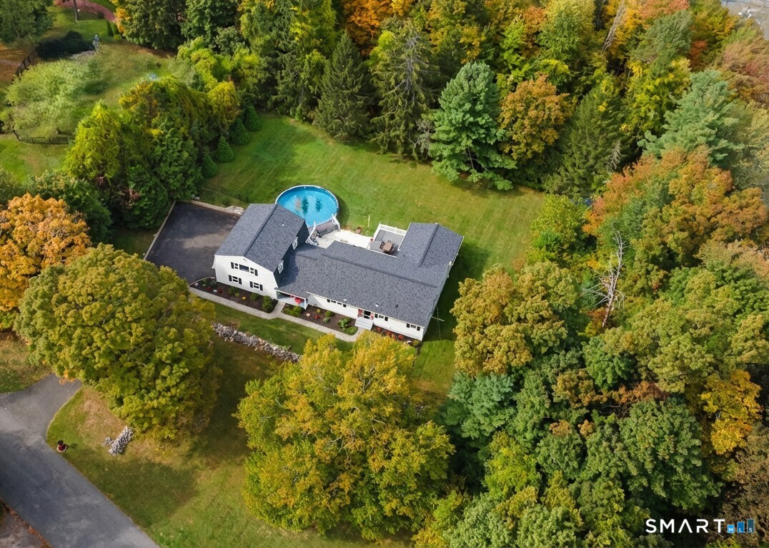 3 Grand Place Newtown, CT 06470 - Photo 32 of 40 The above-ground pool, complete with attached deck, invites you to cool off during those hot summer months.