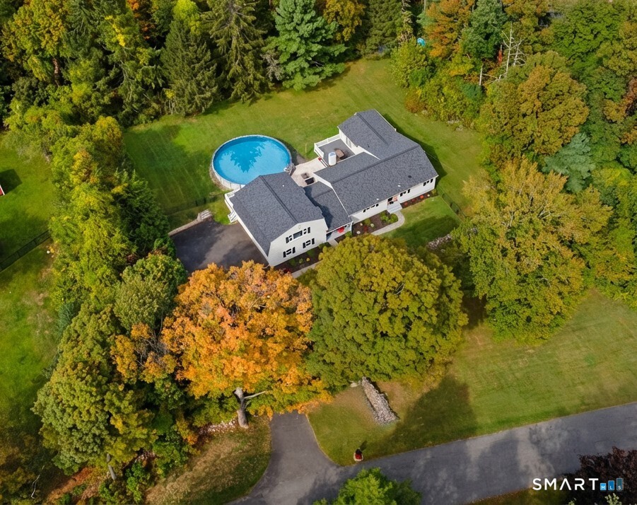3 Grand Place Newtown, CT 06470 - Photo 4 of 40 Enjoy outdoor living with the above-ground pool, two expansive decks and patio.