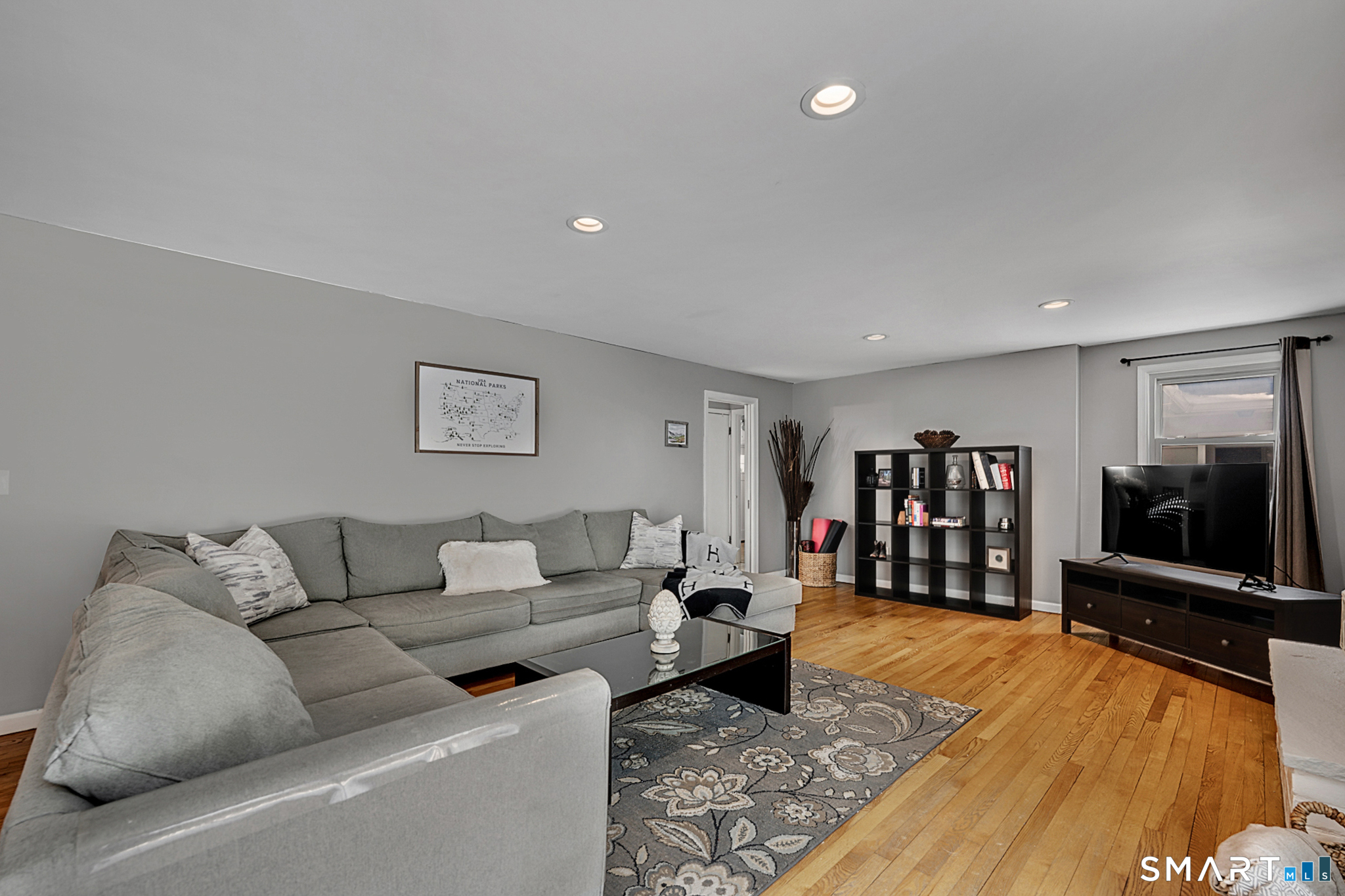 3 Grand Place Newtown, CT 06470 - Photo 6 of 40 Step inside this expansive Living Room which is flooded with natural light.