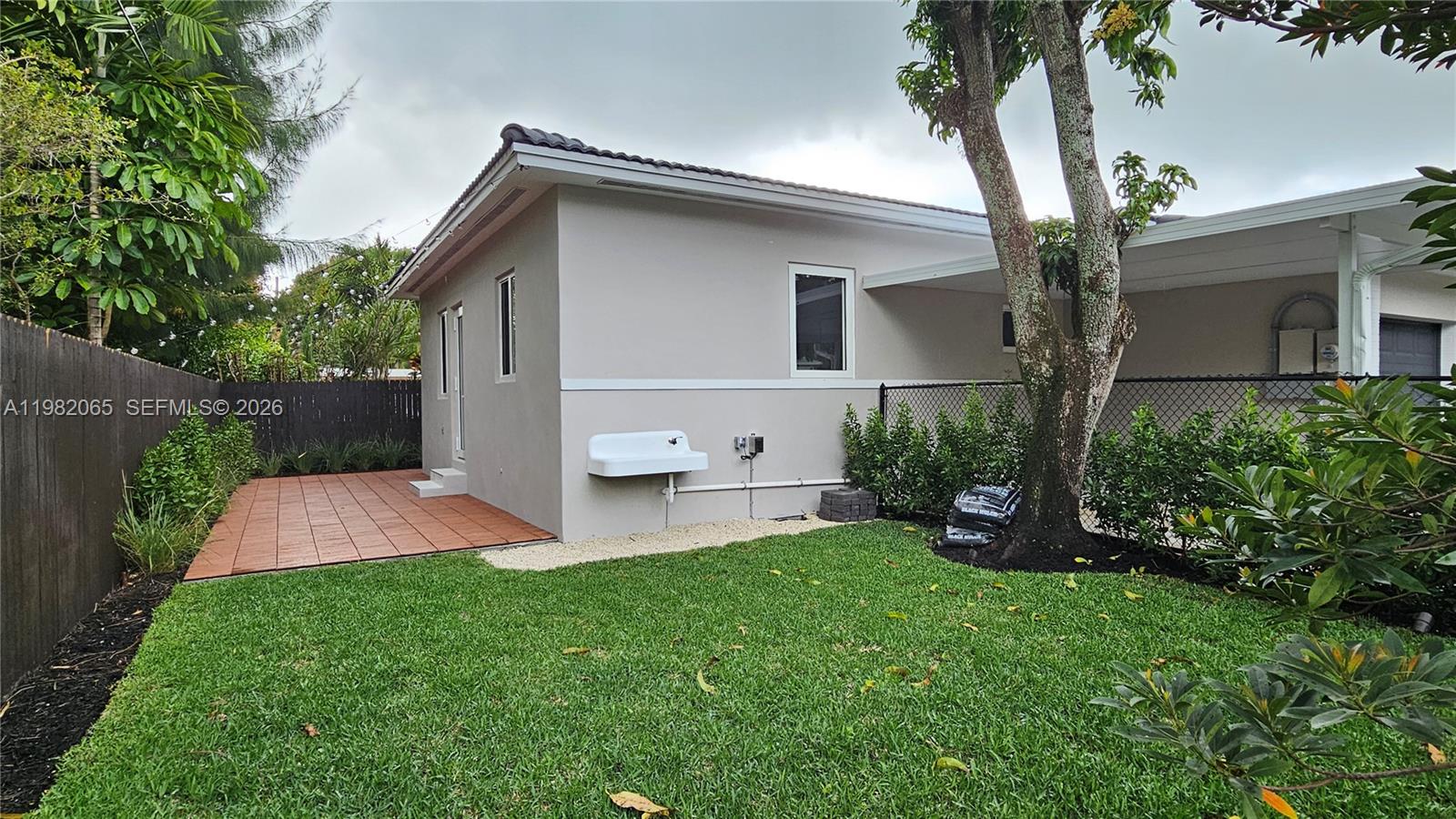 2365 Southwest 21st Avenue Miami, FL 33145 - Photo 23 of 56 a front view of house with a garden