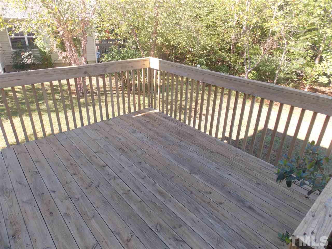 4101 Hopper Street Raleigh, NC 27616 - Photo 12 of 12 a view of a balcony with wooden floor