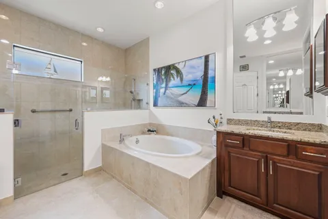 a bathroom with a toilet a sink and a mirror