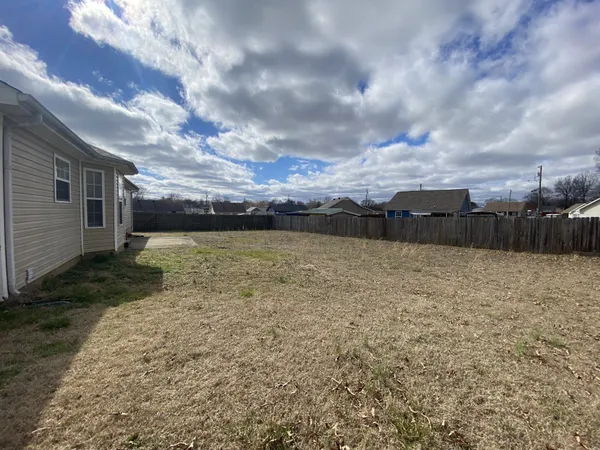 a view of a terrace with a yard