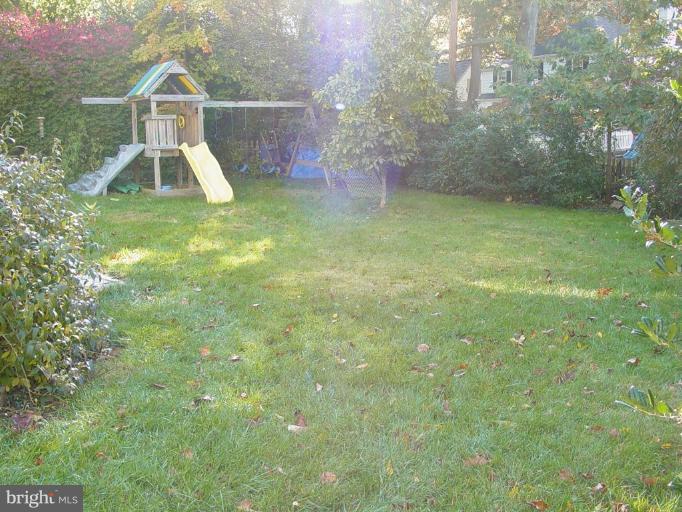 907 Kingston Road Baltimore, MD 21212 - Photo 15 of 23 Rear yard with playset.