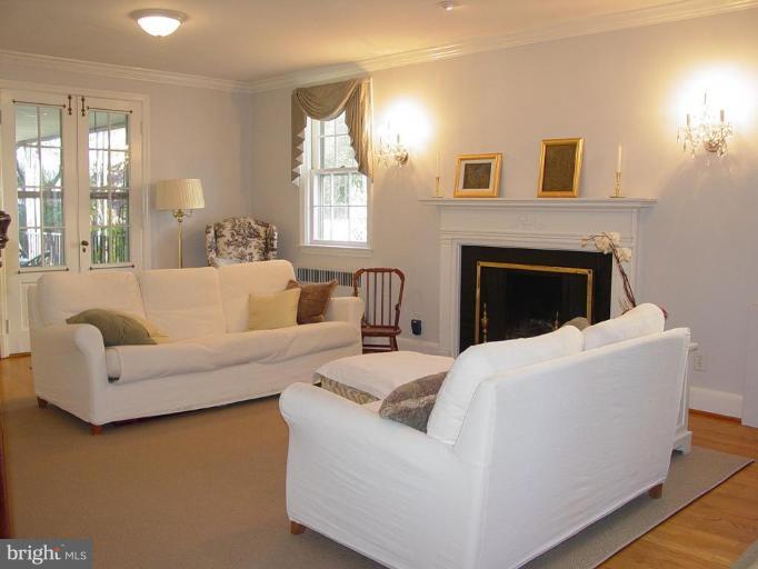 907 Kingston Road Baltimore, MD 21212 - Photo 3 of 23 Bright, sunny living room with flagstone porch.
