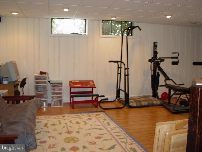 907 Kingston Road Baltimore, MD 21212 - Photo 22 of 23 Lower level rec rm w/ walk out. 9-ft ceilings.