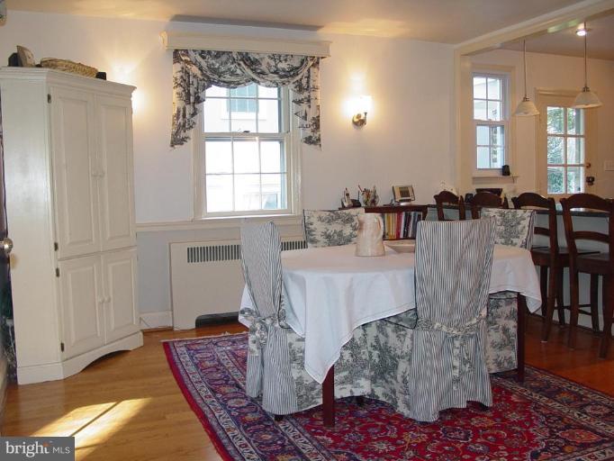 907 Kingston Road Baltimore, MD 21212 - Photo 4 of 23 Open dining room, with breakfast bar in kitchen.