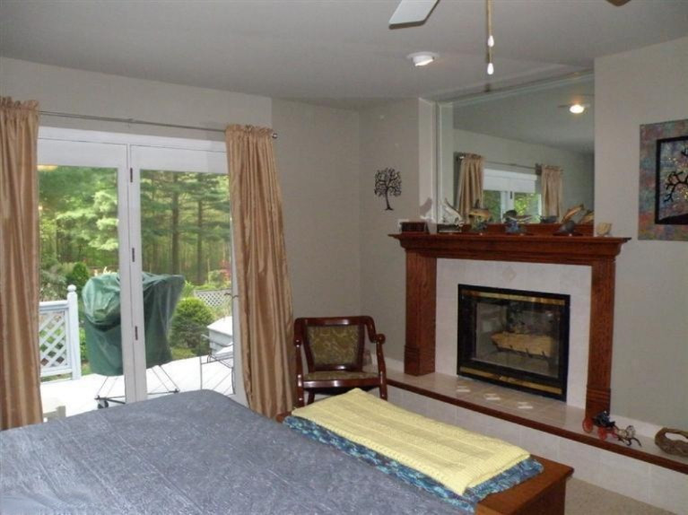 7105 West No Name Road Ludington, MI 49431 - Photo 11 of 28 Master Fireplace