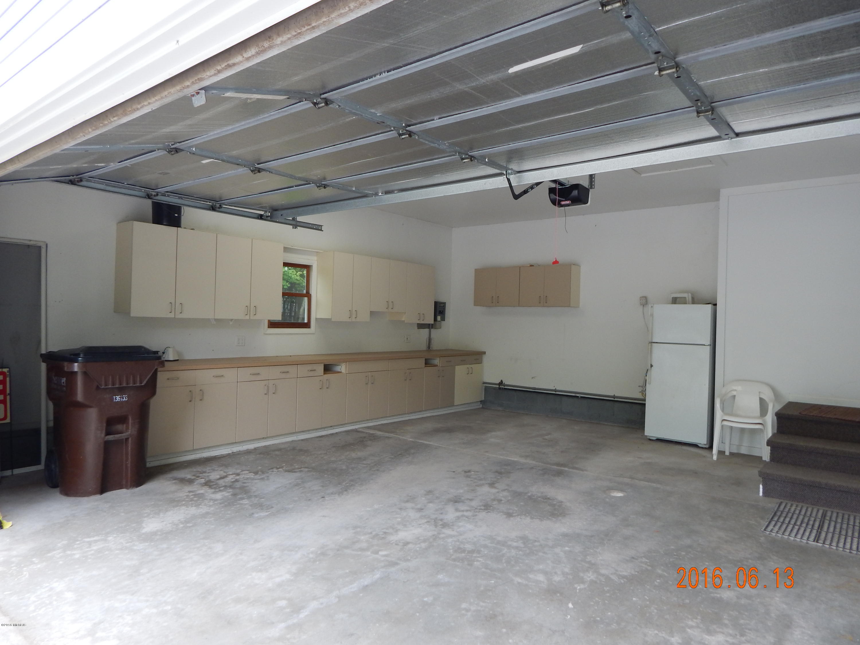 7105 West No Name Road Ludington, MI 49431 - Photo 17 of 28 2 car garage attached