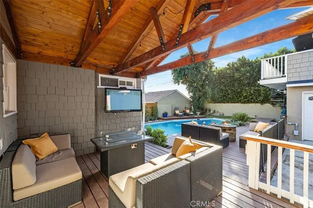 a view of a patio with a table and chairs